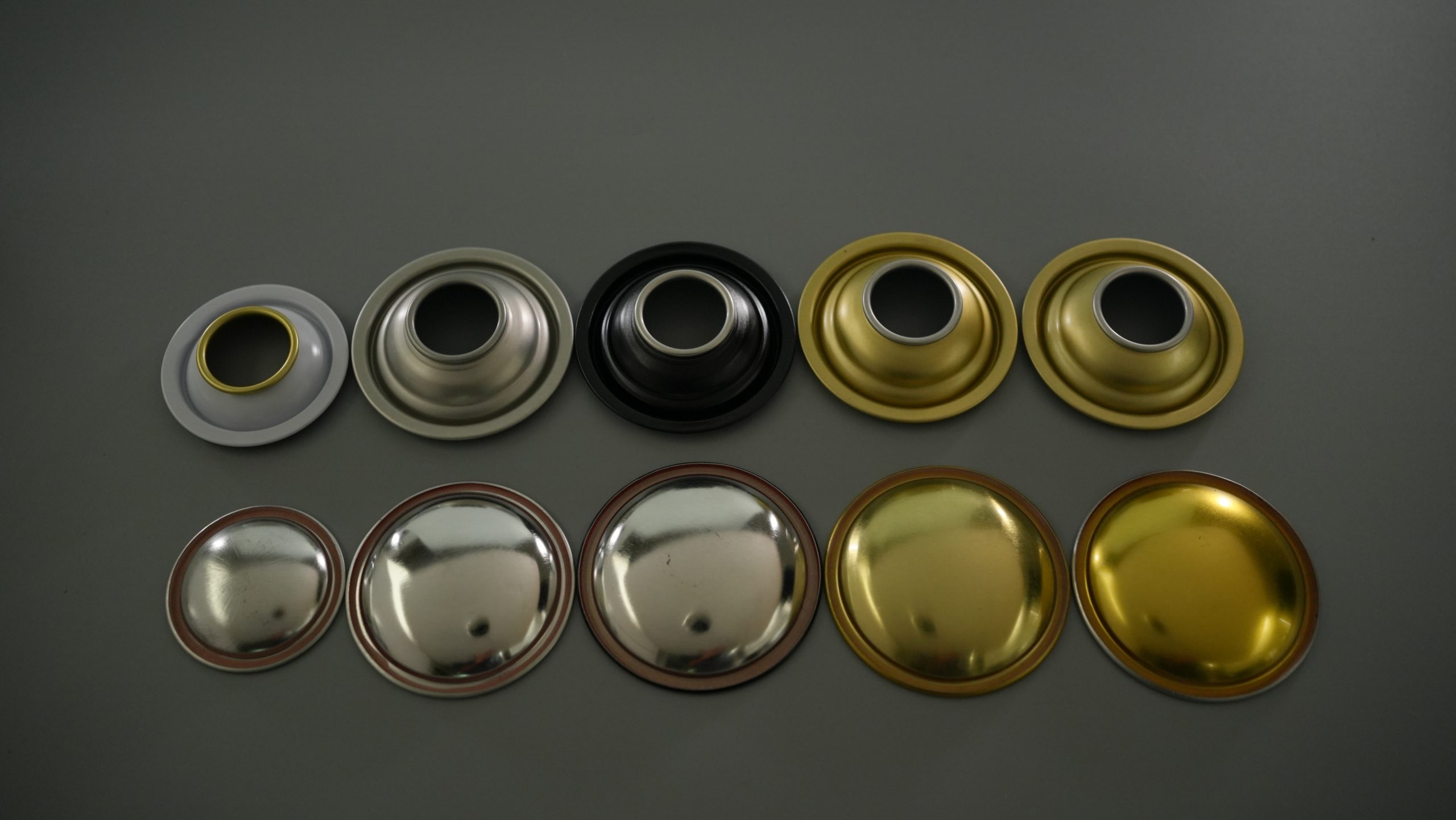 In-depth exploration of the design and functions of the conical and dome-shaped spray cans